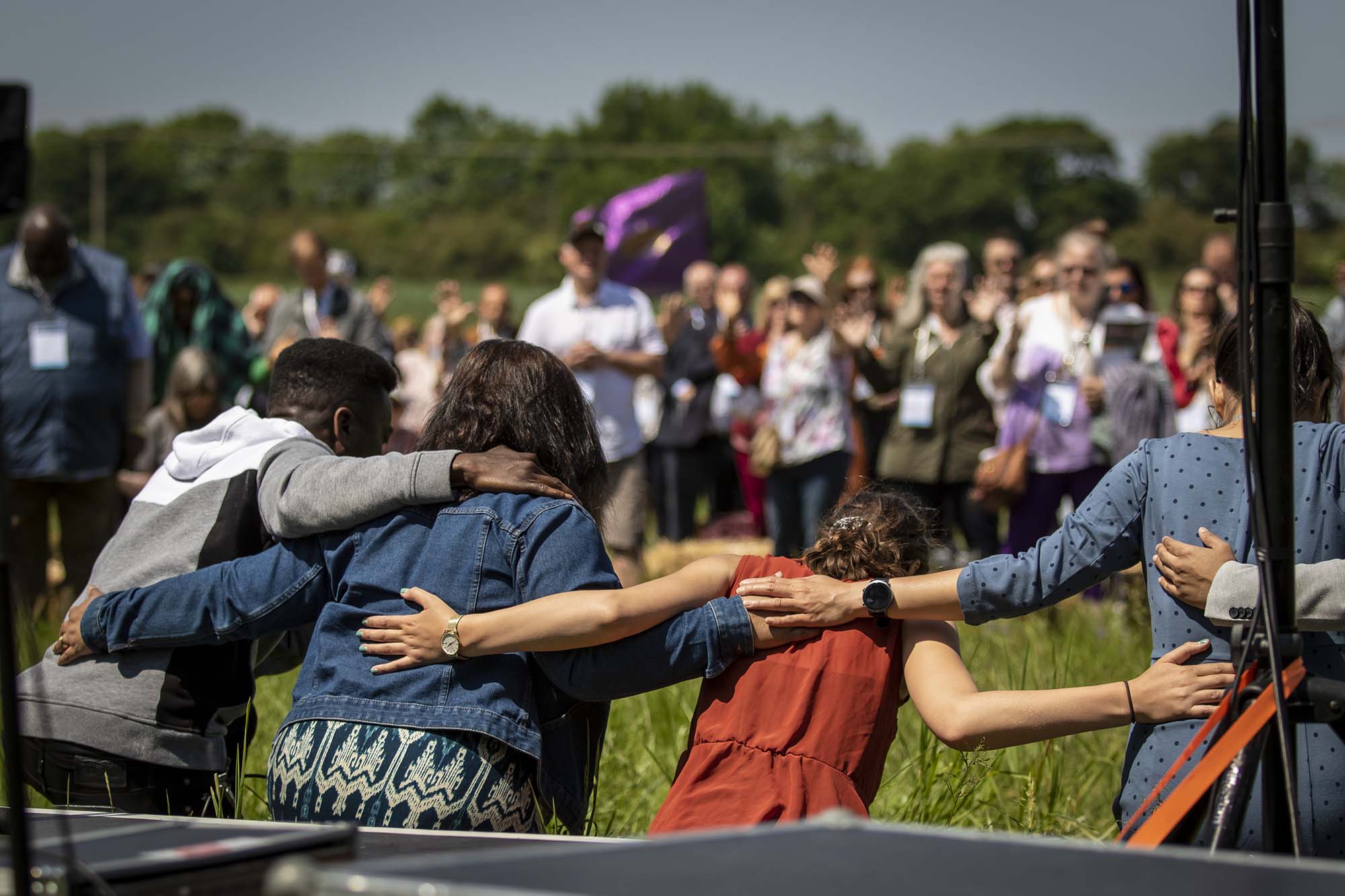 People coming together in prayer